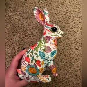 Resin floral bunny figurine
Features a colorful floral design
Ideal for spring
